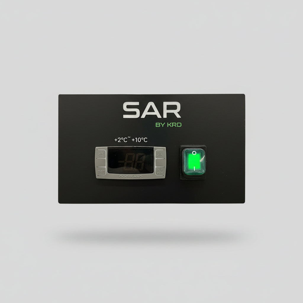 Temperature control panel for commercial kitchen equipment with display and indicator light.