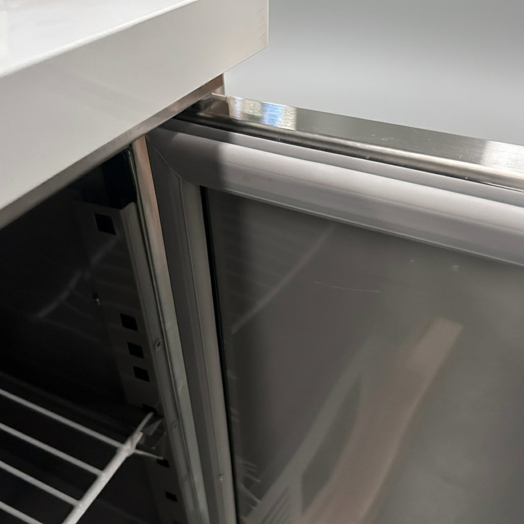 KRD Refrigerated Counter 2 doors Depth 700mm 240 Litres inside view showcasing stainless steel design and storage space.