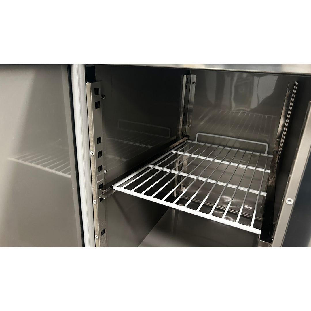 Interior view of KRD Commercial Refrigerated Counter 2 doors Depth 700mm showcasing stainless steel shelves for efficient storage.