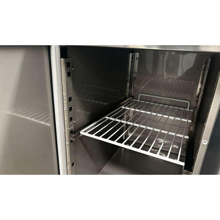 Interior view of KRD Commercial Refrigerated Counter 2 doors Depth 700mm showcasing stainless steel shelves for efficient storage.