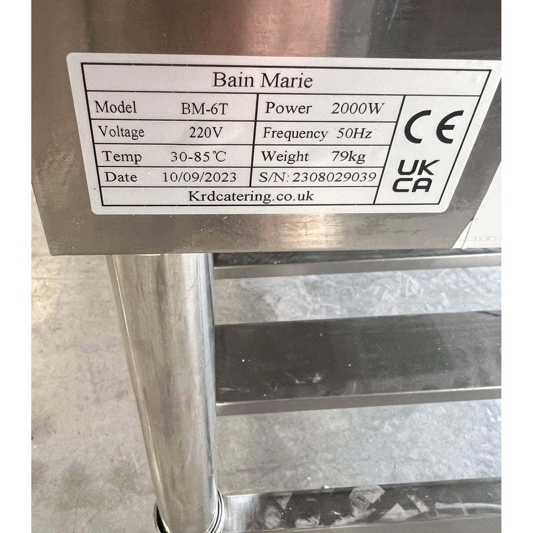 Label of KRD Electric 6 Open Well Steam Table Food Warmer With Under-Shelf detailing model, power, voltage, temperature range, weight.