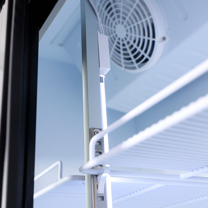 Interior view of KRD Commercial Double Bottle Cooler Fridge 2 Sliding Glass Door 108cm LGF800S showing cooling fan and shelves.