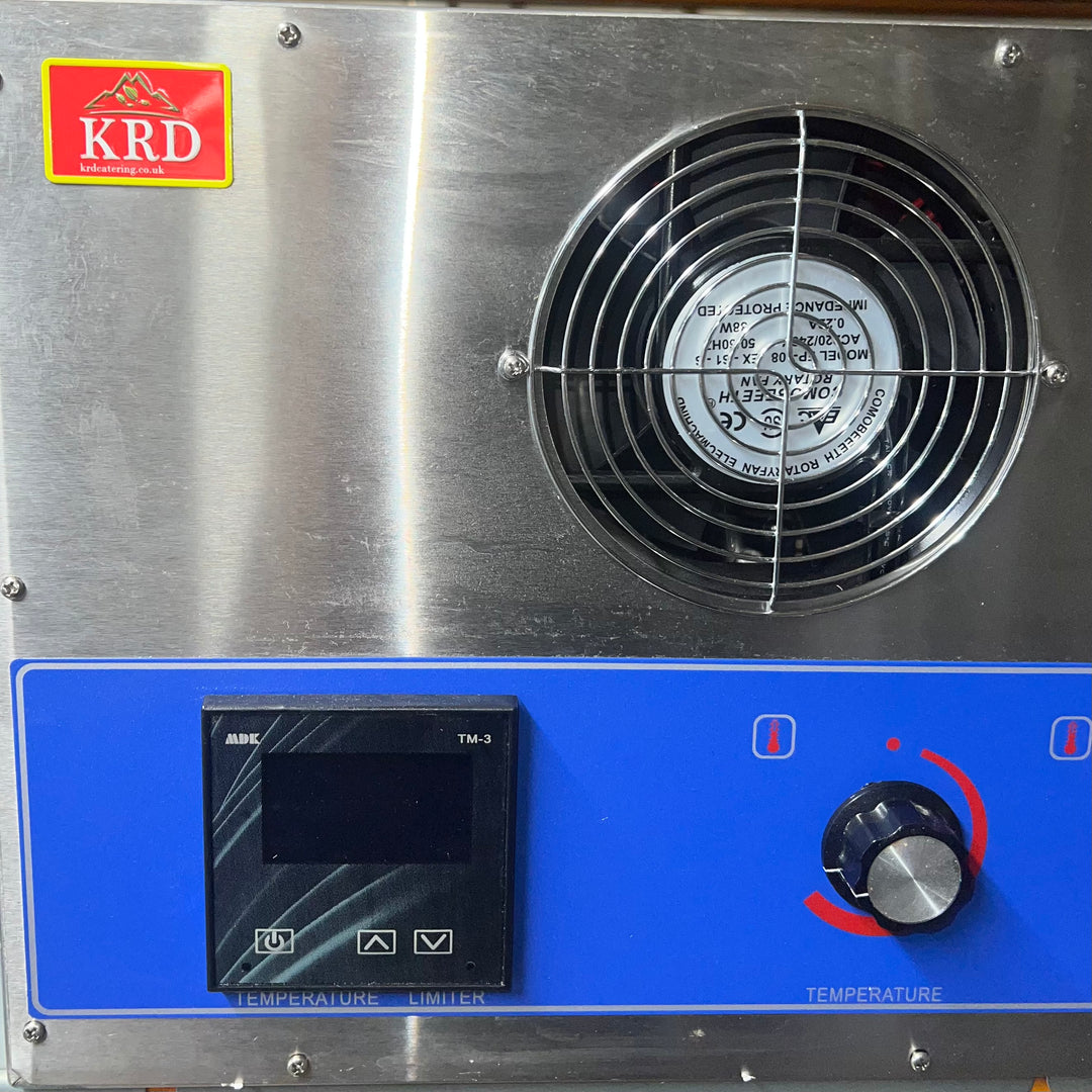 KRD Commercial Conveyor Pizza Oven control panel featuring temperature limiter and fan for optimal cooking efficiency.