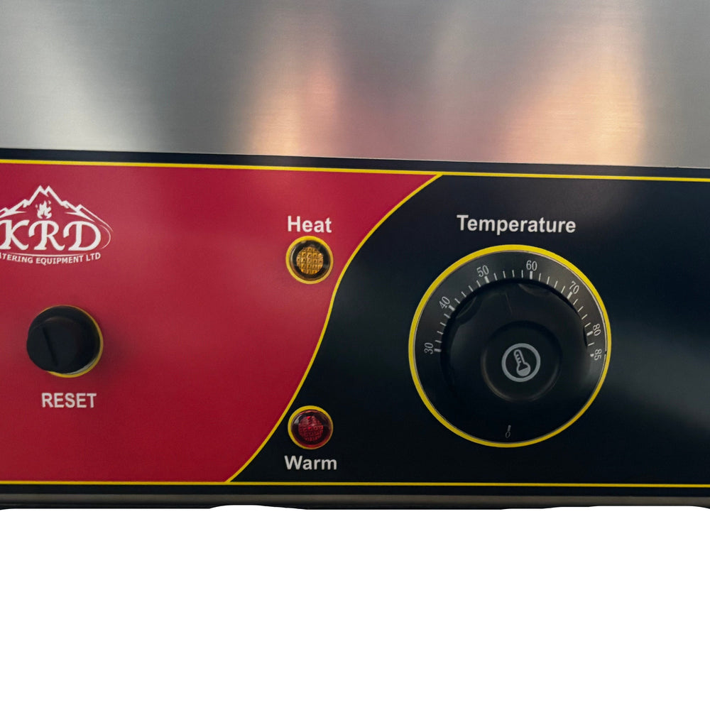 KRD Bain Marie control panel featuring heat and temperature indicators, reset button, and adjustable temperature dial.