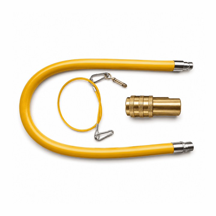 Yellow hose with brass fitting on a white background