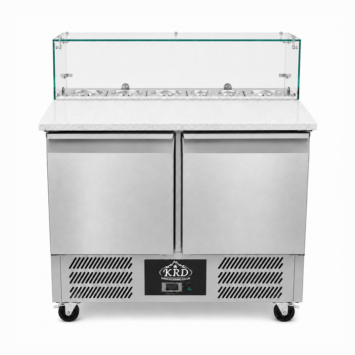 Commercial refrigeration unit with glass top on a white background