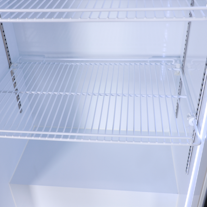 Interior view of shelves in KRD Upright Single Door Glass Display Refrigerator White 68cm LGT460WL for storage.