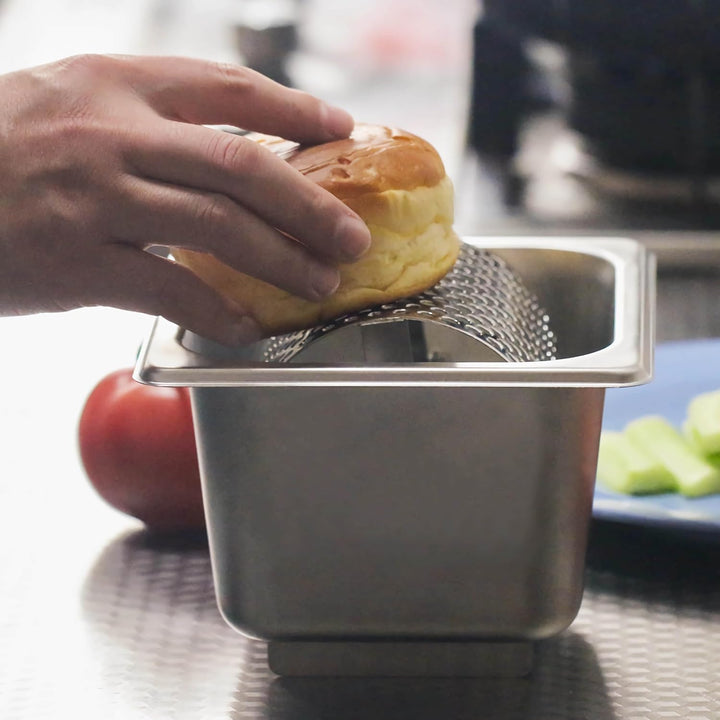 DT-BR100 butter roller in use with bread roll