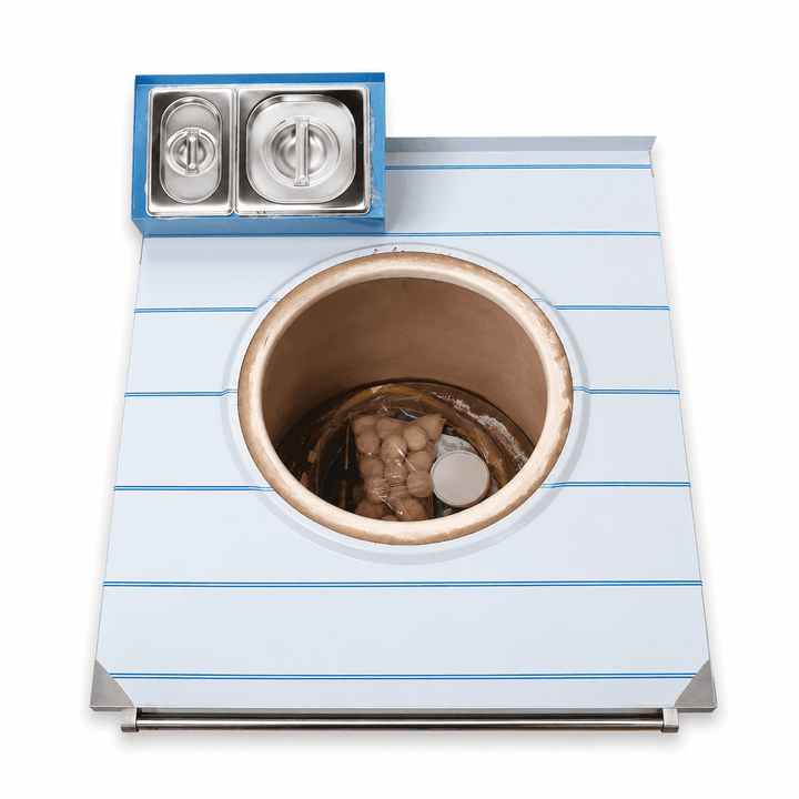 Small stove with a pot on a white background