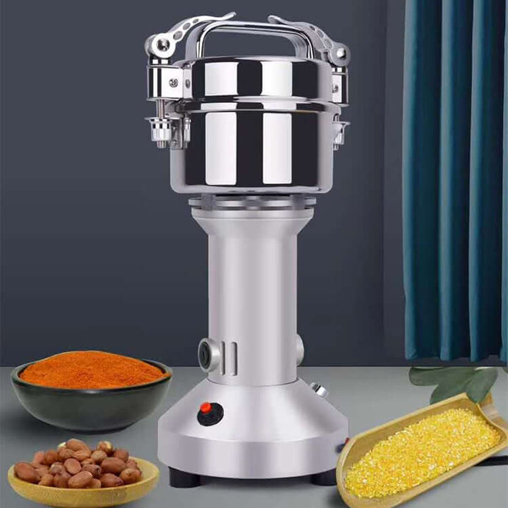 KRD Electric Grain Mill Spice Grinder in silver, showcasing spices and grains on a tabletop.